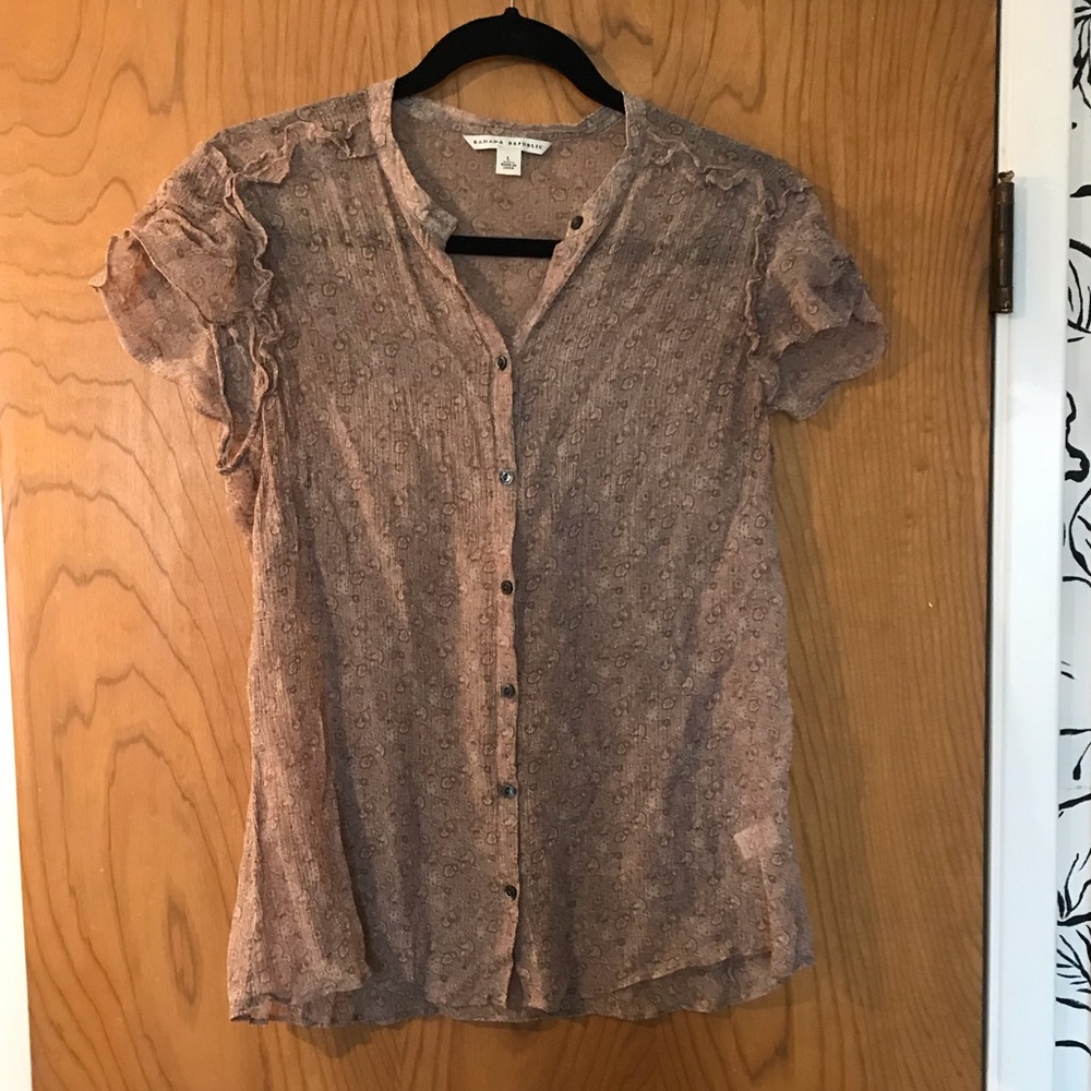 Dainty, sheer blouse, lots of feminine details.